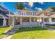 Charming front exterior with a large covered porch, perfect for relaxing outdoors at 418 Eastern Ave, Indianapolis, IN 46201