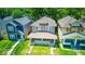 Aerial shot of a charming neighborhood with lush green trees and well-maintained homes at 420 Eastern Ave, Indianapolis, IN 46201