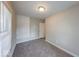 Bright bedroom features neutral paint, new carpet, and a large window for natural light at 420 Eastern Ave, Indianapolis, IN 46201