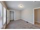 Inviting bedroom with neutral walls, new carpet, and closet, perfect for a relaxing retreat at 420 Eastern Ave, Indianapolis, IN 46201