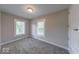 Cozy bedroom featuring neutral walls and new carpet, offering a comfortable and serene atmosphere at 420 Eastern Ave, Indianapolis, IN 46201