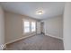 Comfortable bedroom featuring neutral walls and new carpet with a window and closet at 420 Eastern Ave, Indianapolis, IN 46201