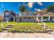 Charming home with a welcoming front porch and a neatly manicured lawn at 420 Eastern Ave, Indianapolis, IN 46201