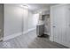 Modern kitchen features gray cabinets, vinyl flooring, and lots of light at 420 Eastern Ave, Indianapolis, IN 46201
