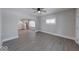 Bright living room featuring new flooring and ample natural light at 420 Eastern Ave, Indianapolis, IN 46201