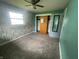 Bedroom with carpet, closet, neutral paint and ample natural light at 4363 Roosevelt Dr, Columbus, IN 47201