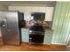 A bright kitchen featuring stainless steel appliances and ample cabinet space for storage at 4363 Roosevelt Dr, Columbus, IN 47201