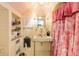 Charming vintage bathroom featuring colorful tile, unique fixtures, and a clawfoot sink at 4601 W Legacy Dr, Muncie, IN 47304