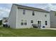 The property features a concrete patio for outdoor living with ample lawn and yard space at 4925 Chip Shot Ln, Indianapolis, IN 46235