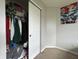 Well-organized closet with ample hanging space and storage solutions, for efficient organization at 4925 Chip Shot Ln, Indianapolis, IN 46235
