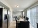 Dining room boasts lots of natural light and seats six at 4925 Chip Shot Ln, Indianapolis, IN 46235
