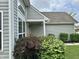 Home with well-manicured front yard and decorative landscaping at 4925 Chip Shot Ln, Indianapolis, IN 46235