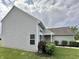 Charming home featuring gray siding, well-maintained landscaping, and an inviting entrance at 4925 Chip Shot Ln, Indianapolis, IN 46235