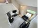 Living room with high ceilings, grey carpet, and two couches at 4925 Chip Shot Ln, Indianapolis, IN 46235