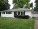Charming single-story home with green lawn and black shutters at 5 Tousley Ct, Indianapolis, IN 46224