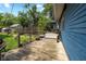 Wooden backyard deck features a bench, room for planters, and view of fenced-in yard at 552 Woodruff Pl W Dr, Indianapolis, IN 46201
