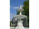 Picturesque fountain with detailed statuary, enhancing the beauty and character of Woodruff Place at 552 Woodruff Pl W Dr, Indianapolis, IN 46201
