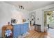 Functional kitchen with blue cabinets, white countertops, and modern appliances for cooking and storage at 552 Woodruff Pl W Dr, Indianapolis, IN 46201