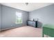 Simple bedroom featuring a window with a view and dresser at 5631 N Peppereel Way, McCordsville, IN 46055