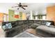 A generously sized living room with a large sectional sofa and open concept feel at 5631 N Peppereel Way, McCordsville, IN 46055