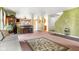 Vintage style living room with light green walls, piano, stylish rug and decor at 5631 N Peppereel Way, McCordsville, IN 46055