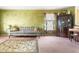 Vintage style living room featuring a comfortable sofa, piano, and stylish decor at 5631 N Peppereel Way, McCordsville, IN 46055