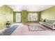 Inviting living room with comfortable seating, vintage decor, and ample natural light at 5631 N Peppereel Way, McCordsville, IN 46055