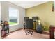 Functional office space with a desk, monitors, a comfortable chair, and a bright window view at 5631 N Peppereel Way, McCordsville, IN 46055