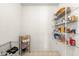 Bright pantry features wire shelving and ample space for storage at 5631 N Peppereel Way, McCordsville, IN 46055