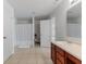 Well-lit bathroom with a vanity, shower, and toilet at 5637 Woodland Trace Blvd, Indianapolis, IN 46237