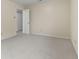 Neutral bedroom with a light beige carpet and cream-colored walls at 5637 Woodland Trace Blvd, Indianapolis, IN 46237