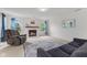 Cozy living room with a brick fireplace, comfortable seating and bright windows at 5637 Woodland Trace Blvd, Indianapolis, IN 46237