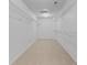 Spacious walk-in closet with ample storage space and neutral carpet at 5637 Woodland Trace Blvd, Indianapolis, IN 46237