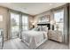 Inviting bedroom with large windows, plush bedding, and modern furnishings at 587 Bluestem Ln, New Whiteland, IN 46184