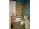 A functional bathroom features a tub/shower combination and a toilet at 5938 Price Ln, Indianapolis, IN 46254