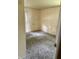A simple bedroom has a window providing natural light and ample space at 5938 Price Ln, Indianapolis, IN 46254