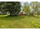 This is an exterior shot of the backyard and deck at 5967 Peregrine Blvd, Indianapolis, IN 46228