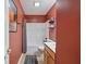 This bathroom features a tub, toilet, sink, and modern fixtures at 5967 Peregrine Blvd, Indianapolis, IN 46228