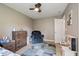 A cozy bedroom with dresser, armchair, and toy kitchen for children to enjoy at 5967 Peregrine Blvd, Indianapolis, IN 46228