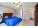 The bedroom features a ceiling fan, and a spacious layout at 5967 Peregrine Blvd, Indianapolis, IN 46228