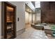 Enjoy this spa area featuring a jacuzzi, sauna, and pool, perfect for relaxation and wellness at 611 N Park Ave # 104, Indianapolis, IN 46204