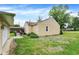 Expansive backyard featuring a deck, lush lawn, providing great outdoor space at 6308 Ratliff Rd, Indianapolis, IN 46113