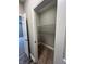 A compact closet features wire shelving and neutral carpeting at 6350 Stallion Way, Indianapolis, IN 46260