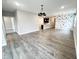 Bright and airy living room featuring modern finishes and an open view into the kitchen at 6350 Stallion Way, Indianapolis, IN 46260
