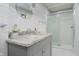 Bright bathroom featuring a white vanity with granite countertop and glass enclosed shower at 6492 Osprey Dr, Nineveh, IN 46164
