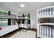 Spacious bedroom filled with multiple bunkbeds, and large windows for natural light at 6492 Osprey Dr, Nineveh, IN 46164