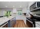 Kitchen featuring stainless steel appliances, a breakfast bar and plenty of counter space at 6492 Osprey Dr, Nineveh, IN 46164