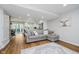 Spacious open-concept living room and kitchen with access to outdoor living space at 6492 Osprey Dr, Nineveh, IN 46164
