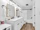 Bright bathroom with double sinks, granite countertops, and plenty of lighting in a modern style at 6853 Kellum Dr, Indianapolis, IN 46221