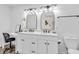 Modern bathroom featuring double sinks, granite countertops, and an ample workspace for added convenience at 6853 Kellum Dr, Indianapolis, IN 46221